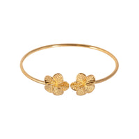 Gold bracelet with floral ends on a white background - 18ct Gold Plated Hibiscus Flower Cuff Torque Bangle - seolgold