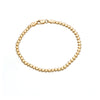 Gold bracelet with star-shaped beads on a white background - seolgold