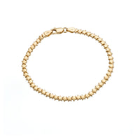 Gold bracelet with star-shaped beads on a white background - seolgold
