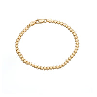Gold bracelet with star-shaped beads on a white background - seolgold