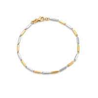 A two-tone yellow gold and silver link chain bracelet on a clean white background - seolgold