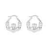 Silver claddagh hoop earrings on a white background - seolgold
