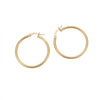 A pair of gold hoop earrings with a polished finish and secure latch back closures, displayed on a clean white background - seolgold