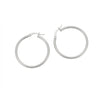 A pair of polished silver hoop earrings with a hinged clasp, displayed on a clean white background - seolgold