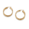 Gold hoop earrings on a white background - seolgold