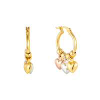 Gold hoop earrings with heart-shaped charms on a white background - Seol Gold