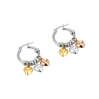 Pair of hoop earrings with heart-shaped charms on a white background - Seol Gold
