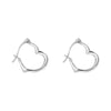 Heart-shaped silver hoop earrings on a white background - seolgold