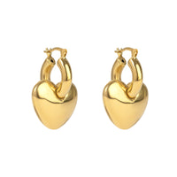 Gold heart-shaped hoop earrings on a white background - seolgold