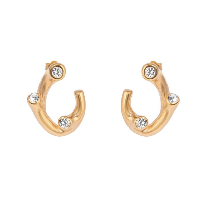 Gold hoop earrings with embedded crystals on a white background - seolgold