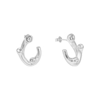 Pair of silver hoop earrings with small gemstones on a white background - seolgold