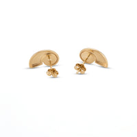 A pair of gold crescent-shaped stud earrings with butterfly backings, shown on a clean white background - seolgold