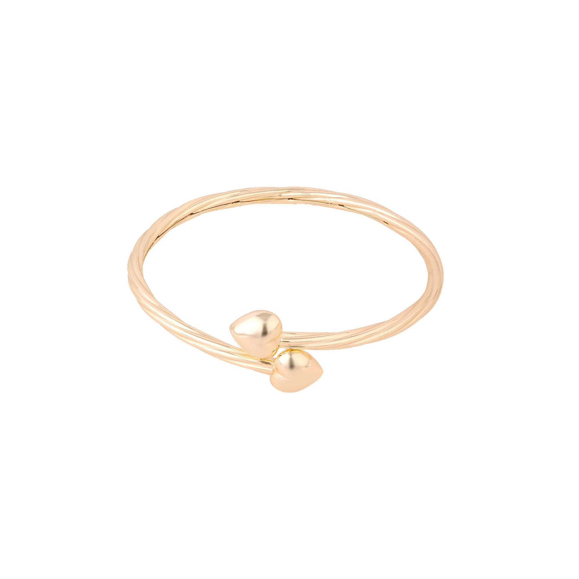 Gold ring with two heart-shaped charms on a white background - seolgold