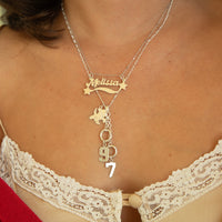 silver necklace with 'Melissa' pendant worn by a person in a lace garment - seolgold