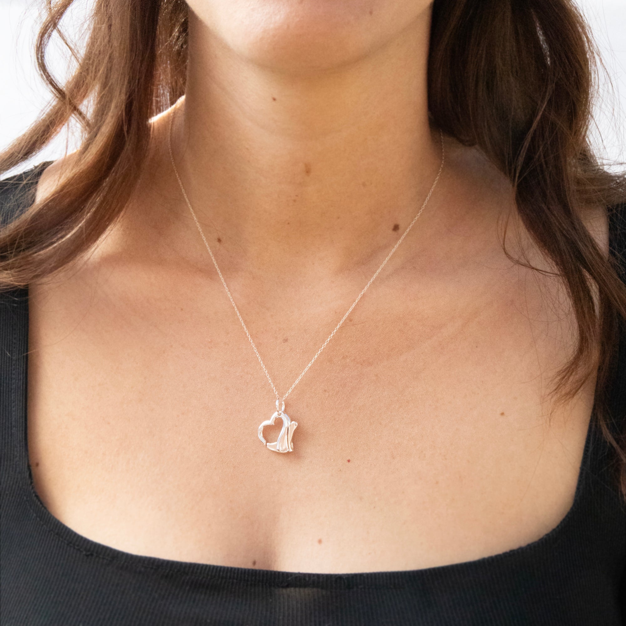 Necklace with a heart pendant worn by a person - Sterling Silver Heart Clasp Charm Connector Pendant - seolgold