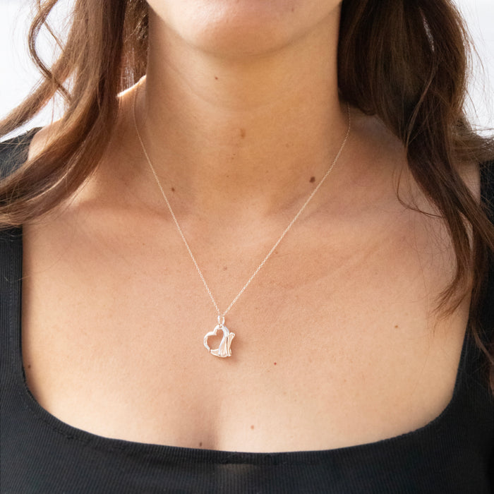 Necklace with a heart pendant worn by a person - Sterling Silver Heart Clasp Charm Connector Pendant - seolgold