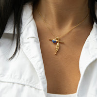 Gold necklace with two pendants on a person wearing a white shirt - gold rolo chain necklace - seolgold