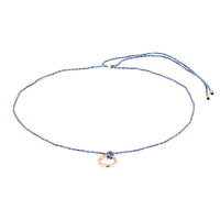 Navy blue string necklace with a gold ring pendant on a white background - seolgold