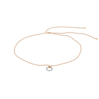 cord necklace with a small silver ring pendant on a white background - seolgold