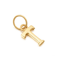 Gold letter 'T' charm on a white background
