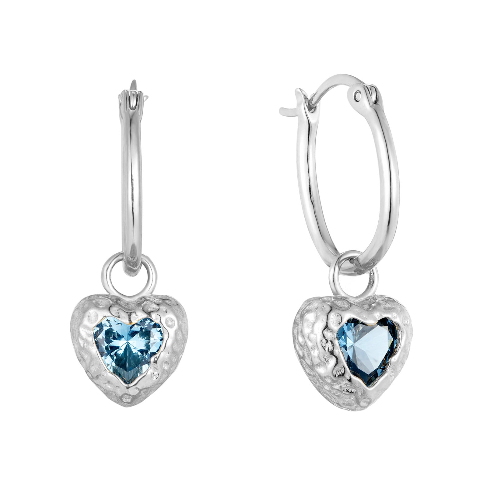 Heart-shaped earrings with blue gemstones on a white background - seolgold