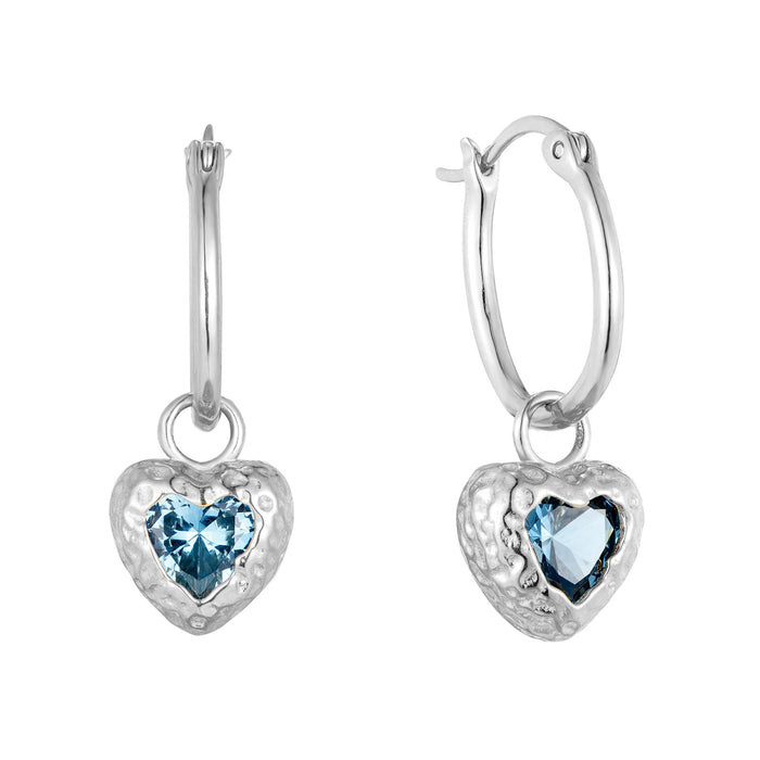 Heart-shaped earrings with blue gemstones on a white background - seolgold