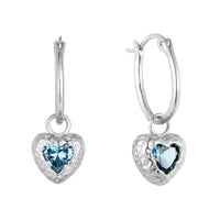 Heart-shaped earrings with blue gemstones on a white background - seolgold