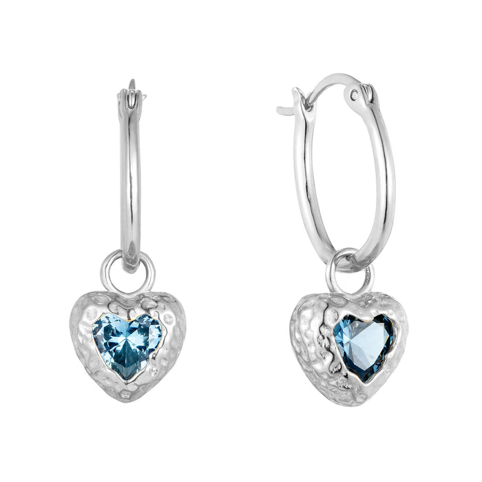 Heart-shaped earrings with blue gemstones on a white background - seolgold
