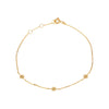 Gold bracelet with star-shaped charms on a white background - seolgold