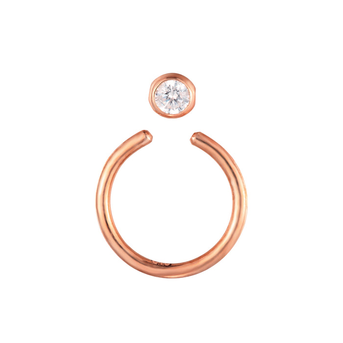Rose gold nose ring with a clear gemstone on a white background - seolgold