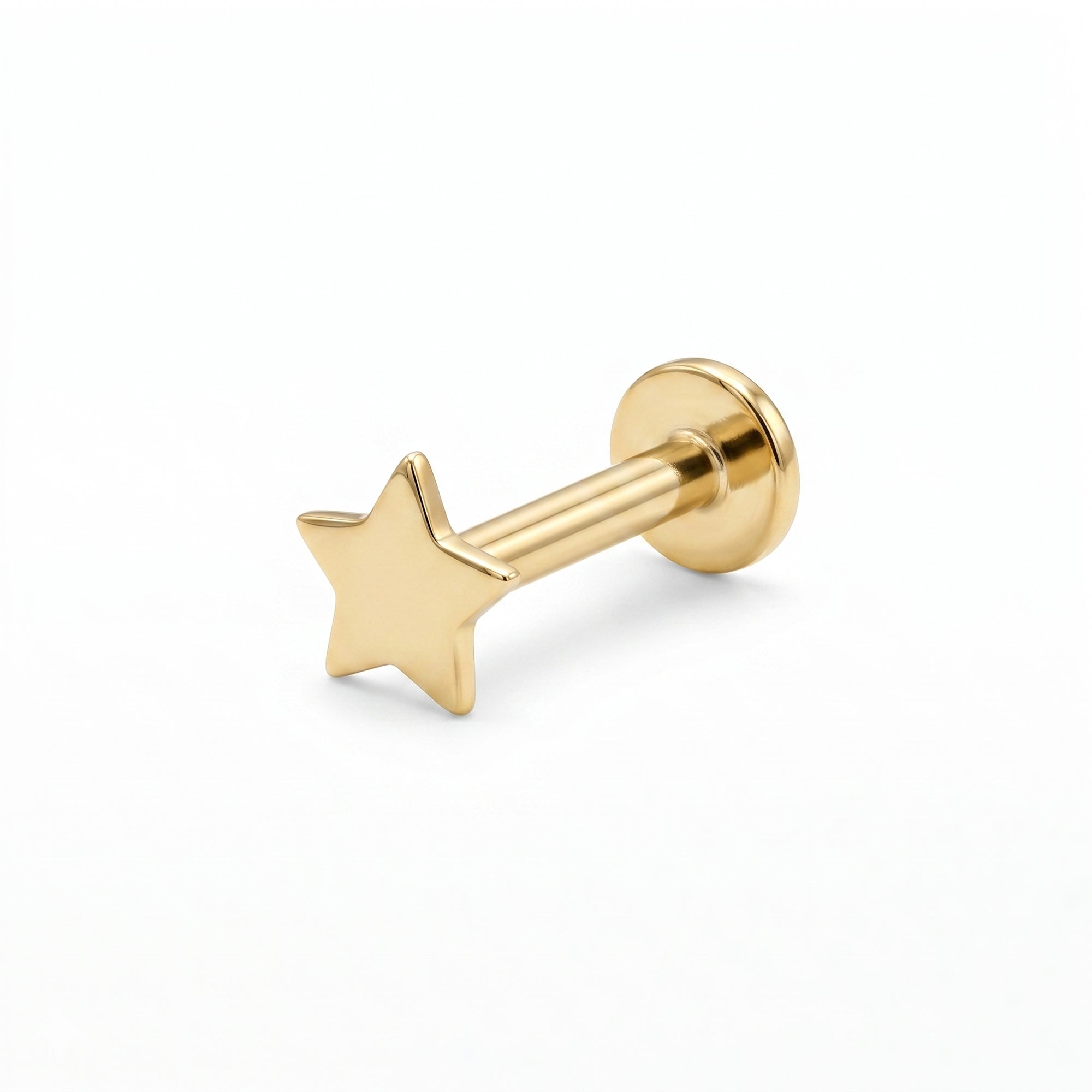 Gold star-shaped earring on a white background - seolgold