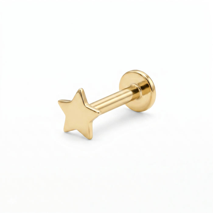 Gold star-shaped earring on a white background - seolgold