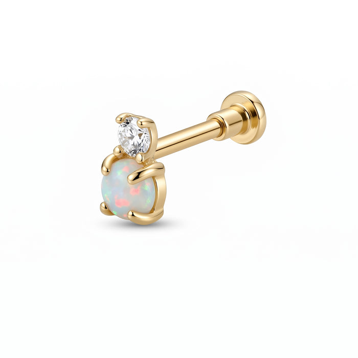 Gold earring with opal stone and clear gem on a white background - seolgold