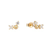 Gold earrings with diamond-like stones on a white background - seolgold