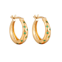 Gold hoop earrings with green gemstones on a white background - seolgold