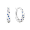 Silver hoop earrings with blue gemstones on a white background - seolgold