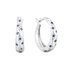 Silver hoop earrings with blue gemstones on a white background - seolgold