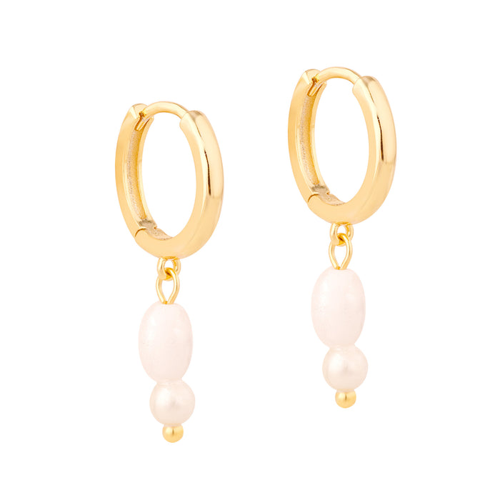 Gold hoop earrings with pearl drops on a white background - seolgold