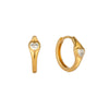 Gold hoop earrings with heart-shaped gemstones on a white background - seolgold