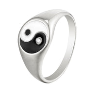 Silver ring with yin yang black and white design on a white background - seolgold