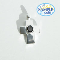 Silver pendant with a black gemstone on a white background, featuring 'S+G Sample Sale' logo.