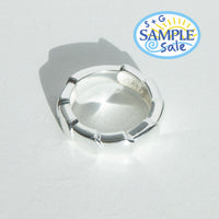 Silver ring on a light gray background with 'S+G Sample Sale' logo.