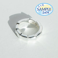 Silver ring on a light gray background with 'S+G Sample Sale' logo.