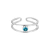 Silver toe ring with a blue gemstone on a white background - seolgold