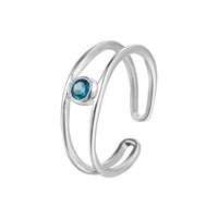 Silver open toe ring with a blue gemstone on a white background - seolgold