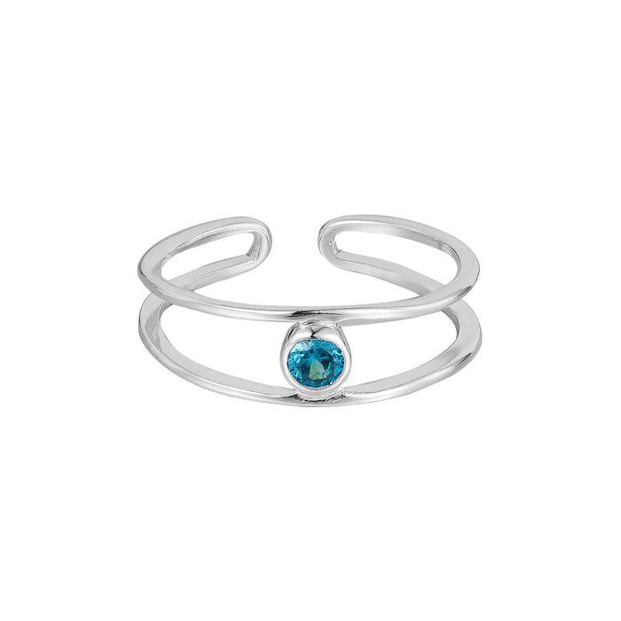 Silver toe ring with a blue gemstone on a white background - seolgold