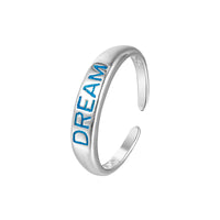Silver ring with 'DREAM' engraved in blue on a white background - seolgold
