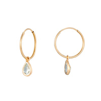 Gold hoop earrings with teardrop-shaped gemstones on a white background - Seol Gold
