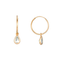 Gold hoop earrings with teardrop-shaped stone on a white background - Seol Gold