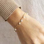 silver charm bracelet- seol gold